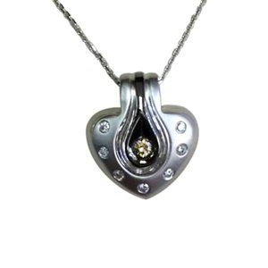 Heart shaped diamond necklace in 14k gold
